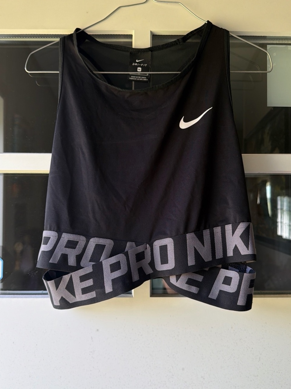 Nike Black Cropped Athletic Tank with Gray Logo Hem